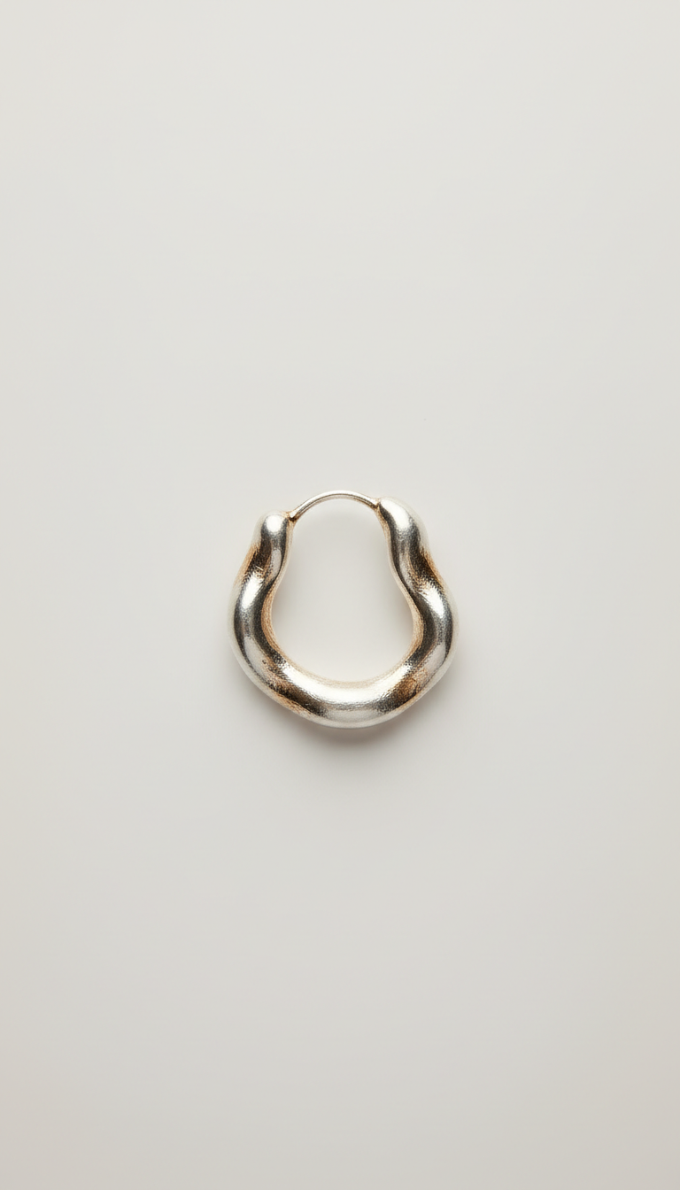 Hand-Worked Silver Sculptural Hoops