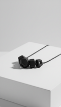 Matte black geometric pendant necklace